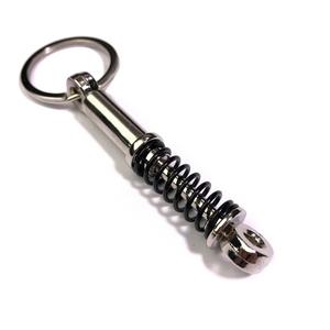 Přívěsek na klíče Tlumič